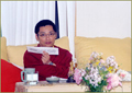 Rinpoche leading a prayer at the retreat center